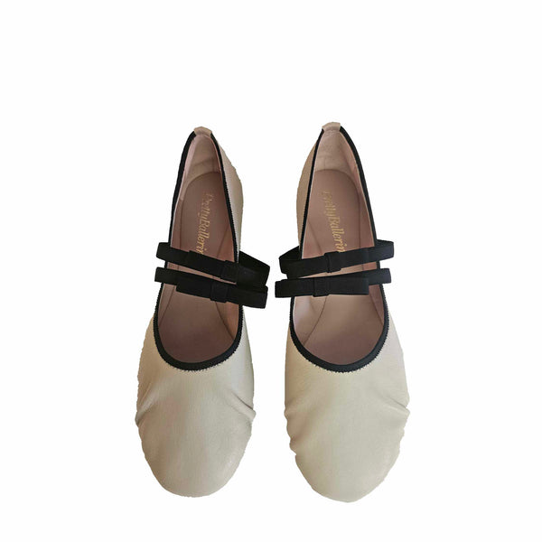 Pretty Ballerina, runder Ballerina in Creme mit schwarzer Paspelierung